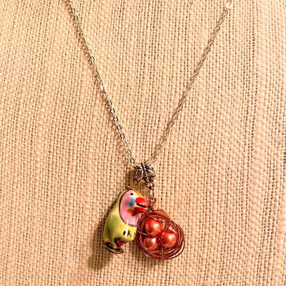 Ceramic Parrot with nest pendant necklace